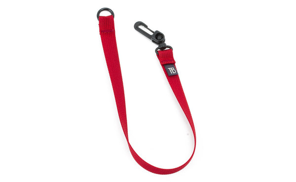 A 16-inch Iberian (red) Key Strap with a snaphook at one end and an o-ring at the other.